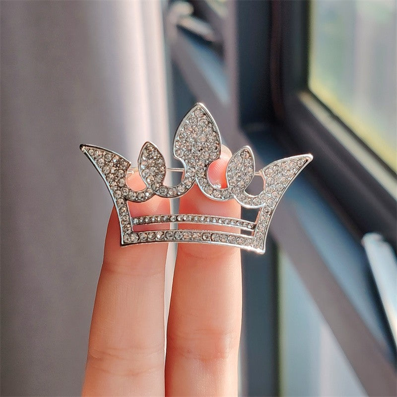 Silver crown brooch accessory