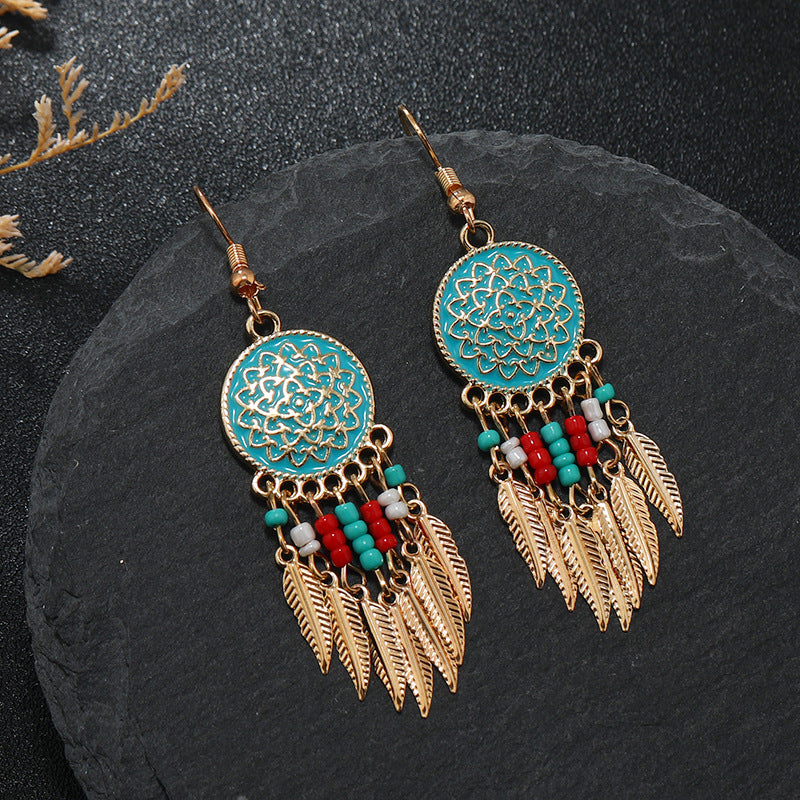Bohemian dreamcatcher tassel earrings red