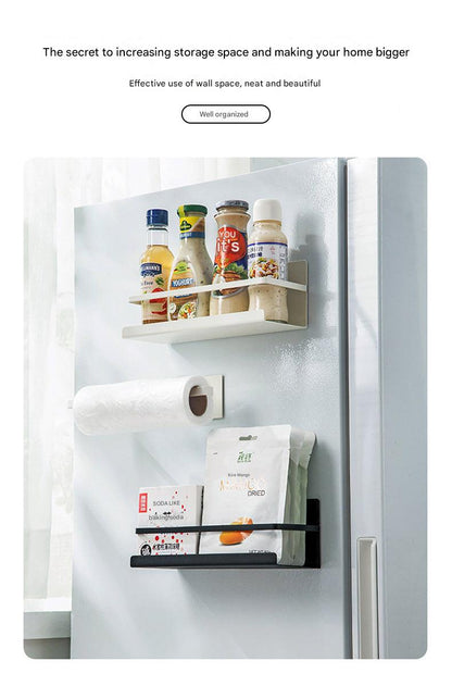 Magnetic paper towel holder mounted on fridge