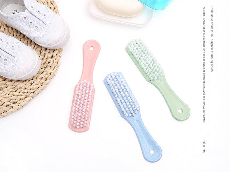 Pink long handle cleaning brush