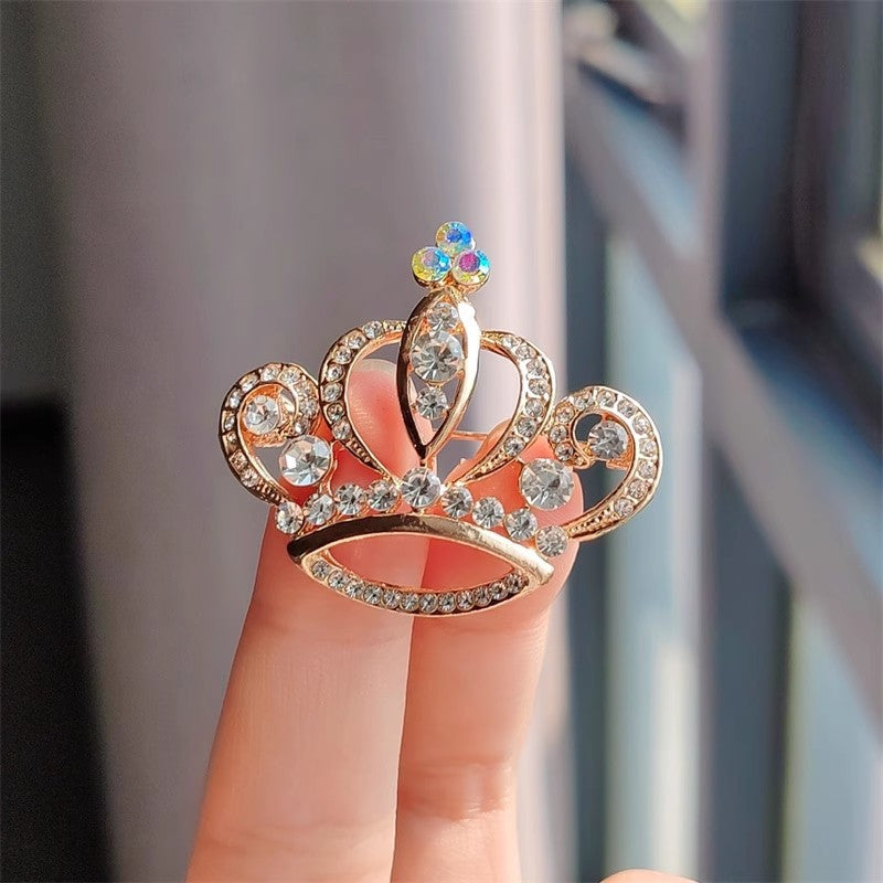 Silver crown brooch accessory