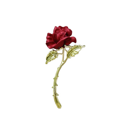 Red rose brooch styled with accessories image 8