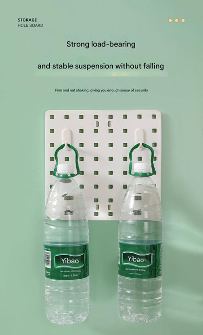 Image of wall-mounted pegboard organizer with various compartments
