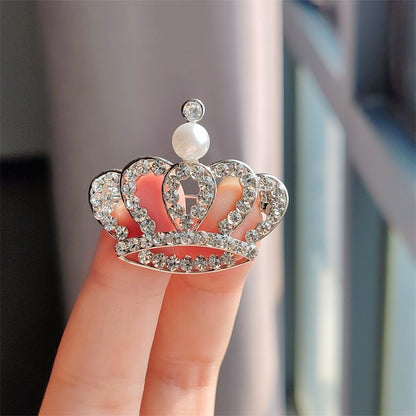 Couple's matching crown brooches