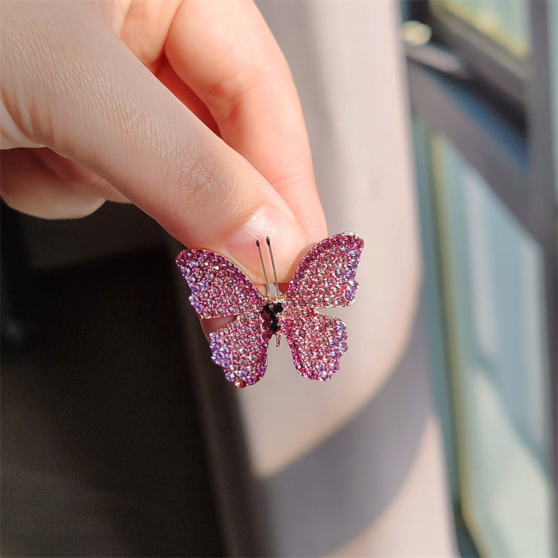 Butterfly Brooch side view showing rhinestone details