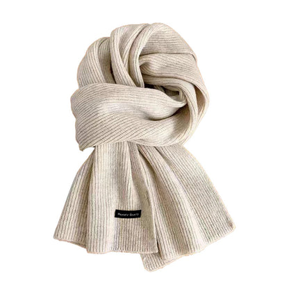 Warm knitted scarf beige color