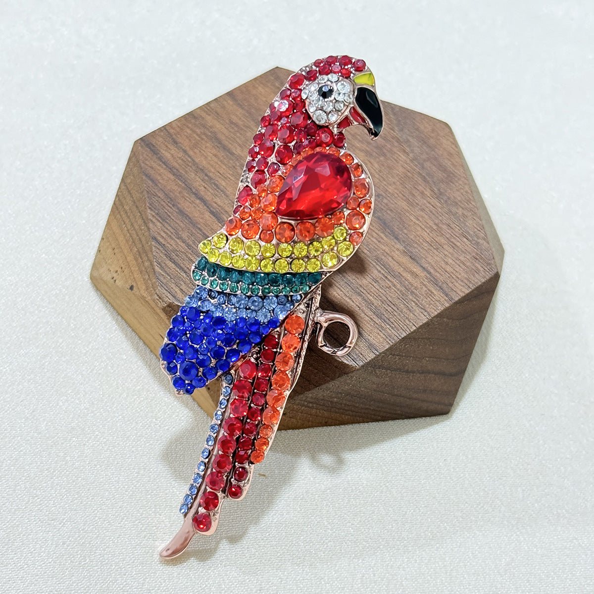 Stylish parrot brooch on fashion accessories
