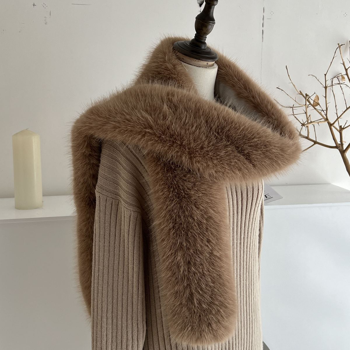 Faux fur long scarf displayed elegantly