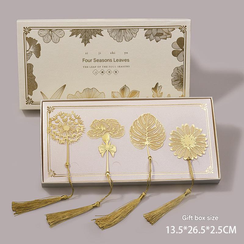 Elegant metal bookmark displayed on an open book