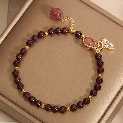 Creative close-up of garnet charm