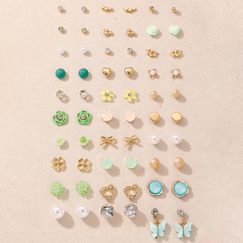 Heart-shaped pearl earrings image 1