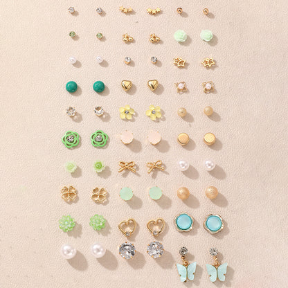 Heart-shaped pearl earrings image 1