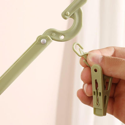 Multiple uses hanger with clothes image 7