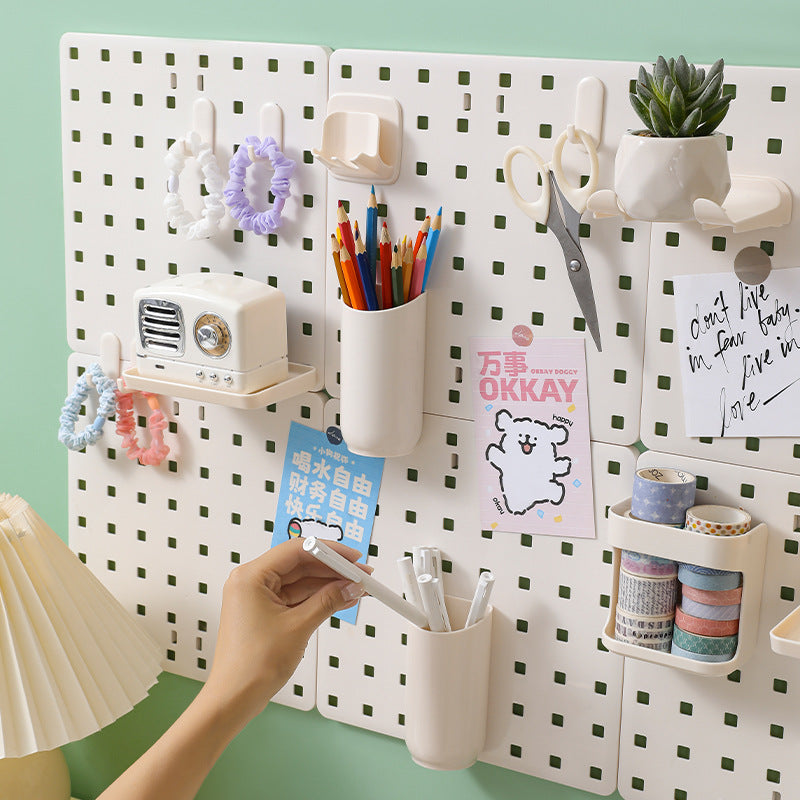 Wall-mounted organizer with colorful storage boxes
