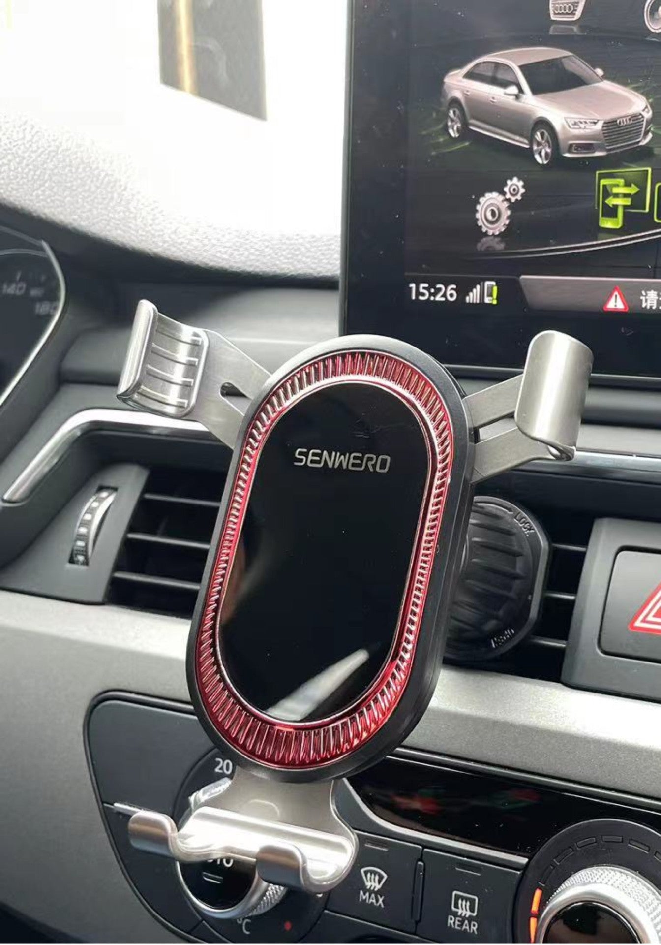 User interacting with smartphone in car mount