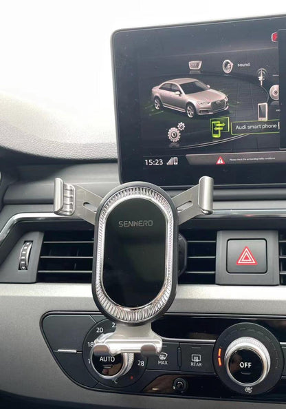 Car phone holder in use for hands-free navigation