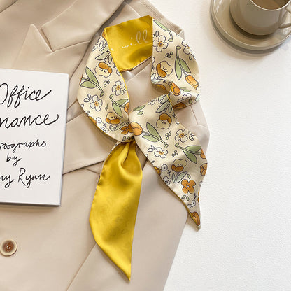 Model wearing yellow scarf in spring