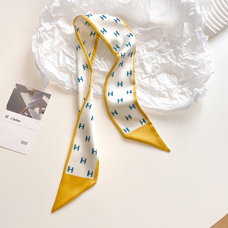 Close-up of multi-functional yellow scarf