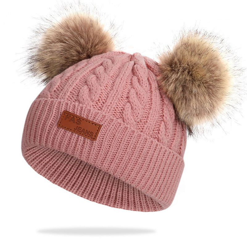 Colorful pom-pom knit hat for children